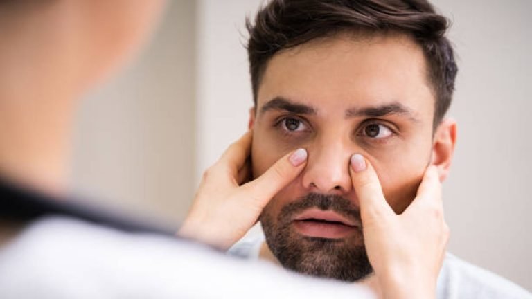 Physician Doctor Doing Sinusitis Examination For Sinus Inflammation